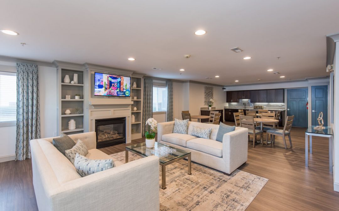 senior living apartment community Social room with two couches